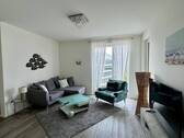 Wohnzimmer - Wohnen am Sonninkanal - Stilvoll möblierte 2-Zimmer-Wohnung mit Wasserblick