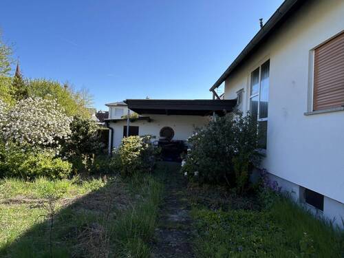 Hausrückseite mit Garten - Einfamilienhaus mit 115,00 m&sup2; in Eckental zum Kaufen