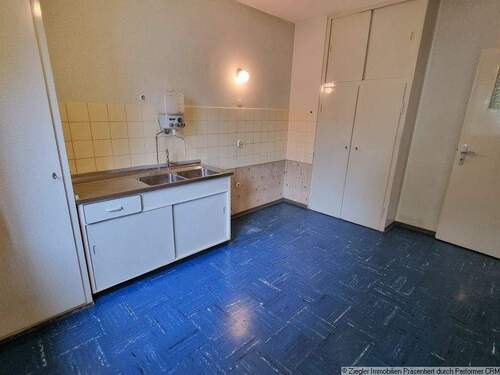 9 EG Wohnküche Ansicht a - 