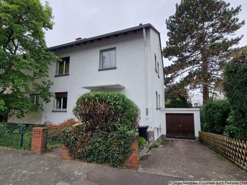 1 Außenansicht - Doppelhaushälfte in absoluter Traumlage Lindenhof - 10004011