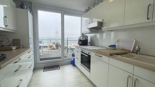 Küche mit Einbauten - Etagenwohnung mit 113,00 m&sup2; in Uhldingen-Mühlhofen zum Kaufen