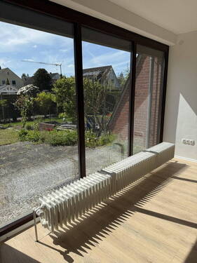 Wohnzimmer mit Gartenblick - Reihenmittelhaus mit 98,30 m&sup2; in Delmenhorst zum Kaufen