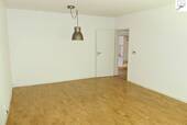 Wohnzimmer Bild II (vor Einzug des Mieters) - 