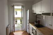 Küche mit Zugang zum Balkon - 