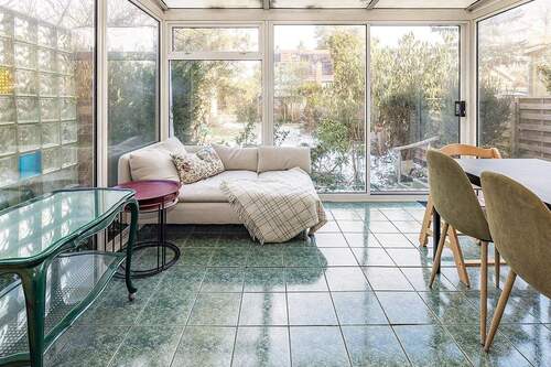 Wintergarten mit Zugang zum Garten - 