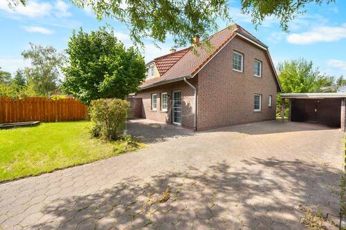 Blick auf die schöne Immobilie - 4 Zimmer Doppelhaushälfte zum Kaufen in Wangerland / Hohenkirchen