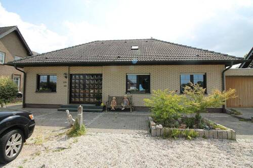 2 Fam. Haus in Rheinberg-Ossenberg - Bungalow mit großem Grundstück, Wintergarten und Einliegerwohnung in Ossenberg