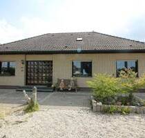 Bungalow mit großem Grundstück, Wintergarten und Einliegerwohnung in Ossenberg - Rheinberg