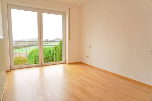 Schlafzimmer mit bodentiefer Fensterfront - 