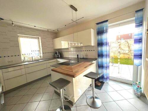 Küche mit Zugang zur Frühstücksterrasse - 