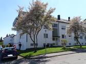 Front - Familienfreundliche 4 Zimmer Wohnung mit Balkon und Garage - sofort frei!