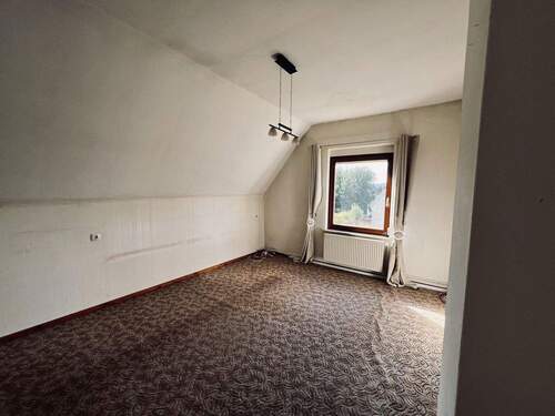 Zimmer OG mit Warmluftschacht - 