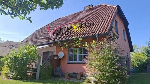 Hausansicht im blühenden Garten - # Ankommen und Zuhause sein! Kinderparadies mit vielen Obstbäumen im Garten! Frei ab August 2026!