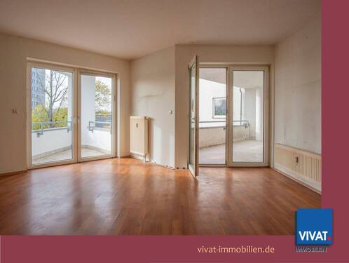 Bild 1 - Extravagante 2ZKB mit Balkon, großer Loggia, TG-Stellpl.. Zentrum fussläufig. MODERNISIERUNGSBEDARF!
