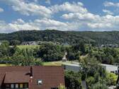 Blick Balkon Süd - Etagenwohnung mit 68,60 m² in Rudersberg zum Kaufen