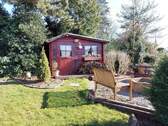 Die Gartenhütte mit zusätzlichem Sitzplatz - 