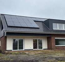 Moderne Erdgeschosswohnung mit Garten, Garage und zwei Terrassen in Wilsum