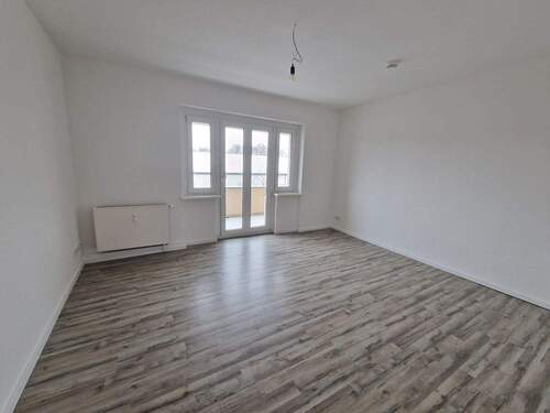 Wohnzimmer - 3 Zimmer Etagenwohnung in Magdeburg