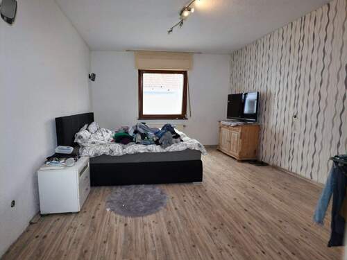 Schlafzimmer im Obergeschoss Vorderhaus - 