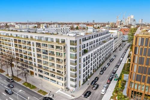 Hausansicht The Grand mit Nachbarschaft - 