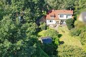 Titel Gartenseite - Hummelsbüttel - vielseitiges Zuhause mit möglicher Einliegerwhg. auf einem traumhaften Grundstück