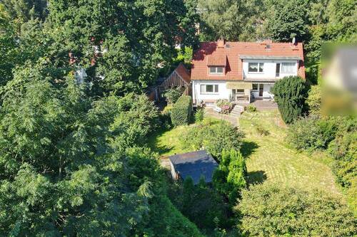 Titel Gartenseite - Hummelsbüttel - vielseitiges Zuhause mit möglicher Einliegerwhg. auf einem traumhaften Grundstück