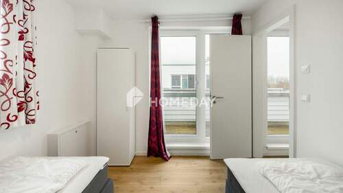 1. OG Schlafzimmer 2 - 