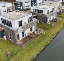 Zweitwohnsitz zum Wohlfühlen: exklusives Ferienhaus mit Terrasse, Balkon und Garten - Butjadingen Tossens