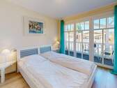 Schlafzimmer mit Zutritt zum Nord-Balkon - 