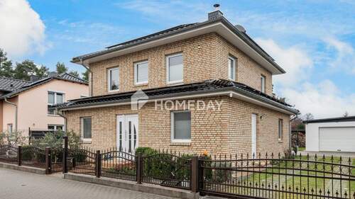 Außenansicht 2 - EFH mit 5 Zimmern für höchste Ansprüche mit schönem Garten, Erdwärmepumpe und exklusiver Ausstattung