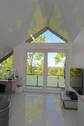 Wohnbereich - Aussicht, Natur und Design: exquisite 3-Zimmer Dachgeschosswohnung in Freiburg St. Georgen