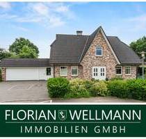 Heeslingen | Stilvolles Einfamilienhaus läßt keine Wünsche offen - Pool, Kamin und toller Garten.