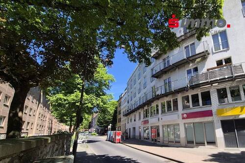 Titelbild - Unmittelbar am SuperC gelegene vermietete Eigentumswohnung mit traumhafter Terrasse