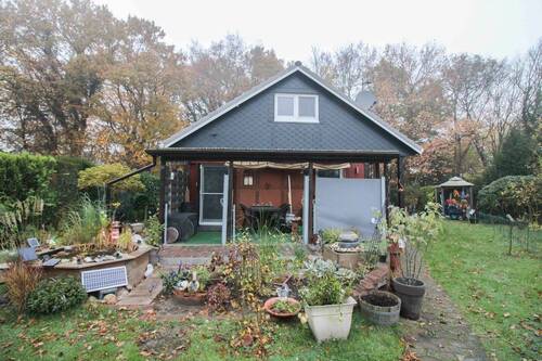 Vorderansicht 2 - Eigenheim mit ca. 72,92 m² wohnlich nutzbarer Fläche, Garten und Stellplatz in ruhiger Randlage