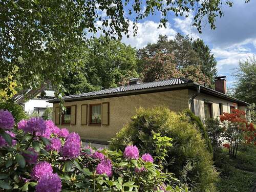 Außenansicht Straßenseite - 5 Zimmer Bungalow zum Kaufen in Buchholz