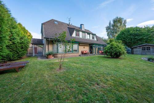 Gartenansicht - Mehrfamilienhaus, Wohnhaus mit 240,00 m&sup2; in Brokstedt zum Kaufen