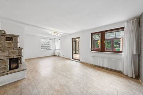 Zugang Wintergarten - Einfamilienhaus mit 117,00 m&sup2; in Berlin zum Kaufen