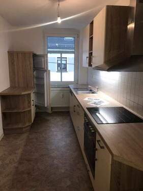 IMG_2372 - Großzügige 3-Zimmer mit Laminat, Balkon, EBK, SP und Wannenbad in ruhiger Lage!