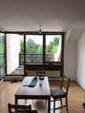 Wohnzimmer und Dachterrasse - 2 Zimmer Etagenwohnung zum Kaufen in Unterschleißheim