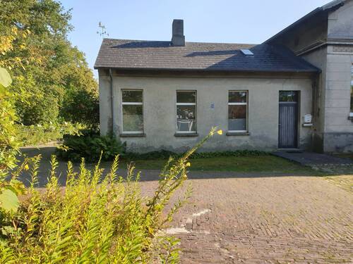 Außensicht - Mehrfamilienhaus, Wohnhaus mit 212,00 m&sup2; in Zetel zum Kaufen