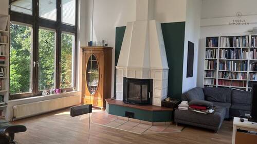 Wohnzimmer mit Kamin - Einfamilienhaus mit 213,90 m² in Königswinter / Niederbuchholz zum Kaufen