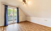 Schlafzimmer 2 im Obergeschoss mit Loggia - 
