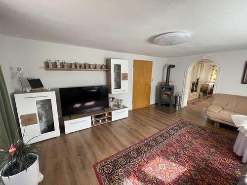 Wohnzimmer 1. OG mit Kamin - 