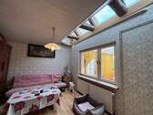Wohnzimmer mit Dachfenster - 