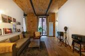 Wohnbereich mit Blick zur Terrasse - 2 Zimmer Etagenwohnung in Berlin