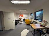 Modernes Büro mit Sitzbereich - 