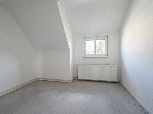 Zimmer im Dachgeschoss - 