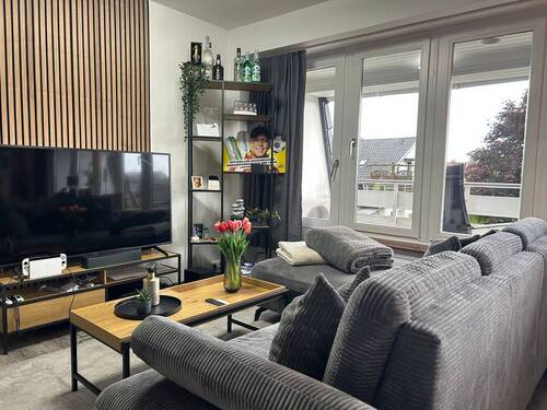 Wohnzimmer - KEINE MAKLERPROVISION! Renovierte 2-Zimmer-Wohnung mit Blick auf den Deich in Burhave!