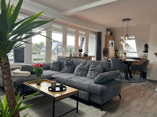 Wohn- und Esszimmer mit offener Küche - 2 Zimmer Etagenwohnung zum Kaufen in Butjadingen