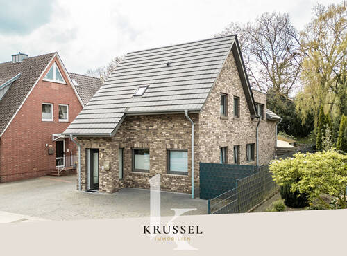 Herzlich willkommen bei KRÜSSEL IMMOBILIEN - NEU: Modernes Zweiparteienhaus in gefragter Lage zum Kauf!